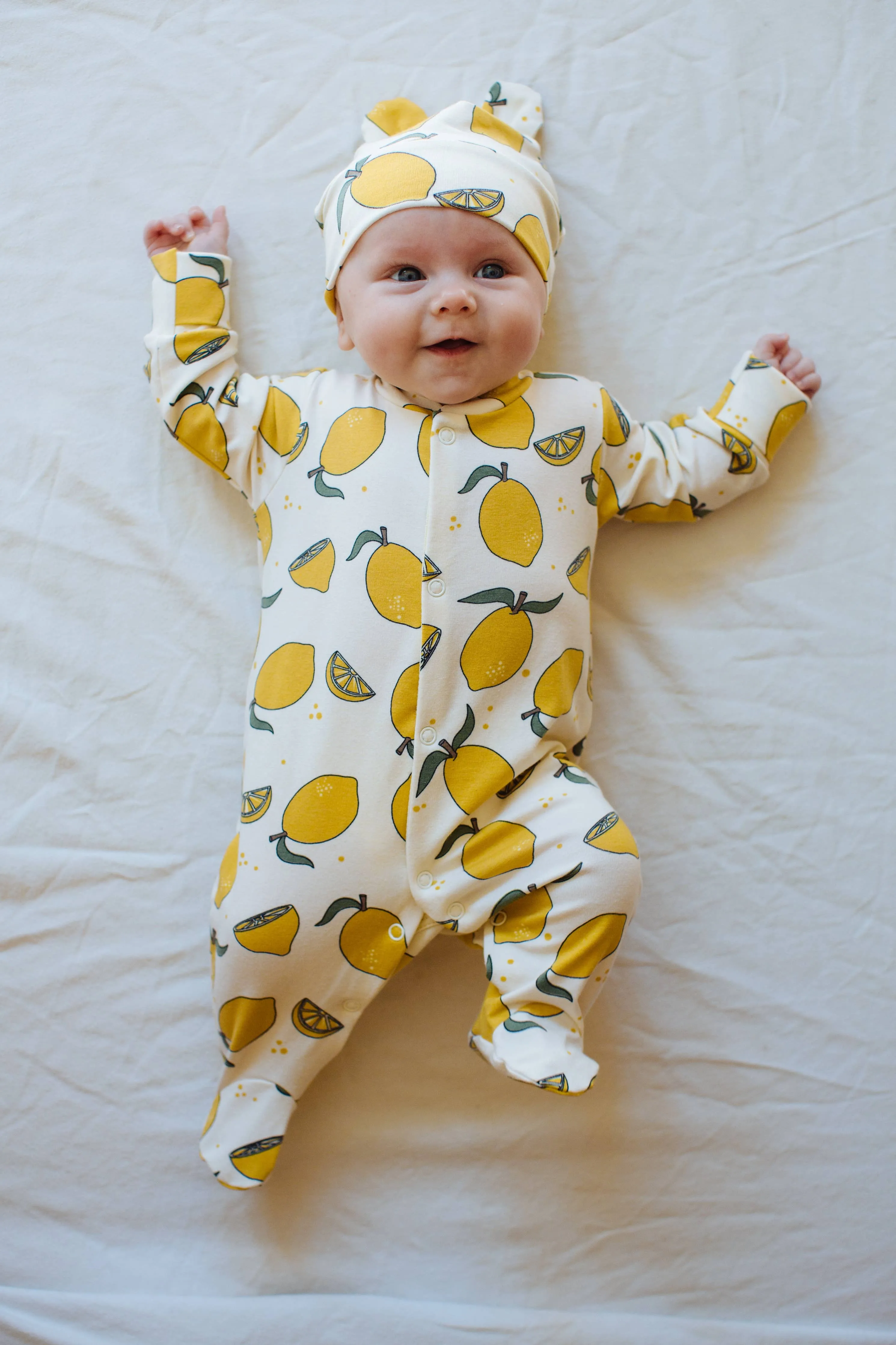 Organic cotton Baby sleepsuit  in Cream with Lemon print - Eddie & Bee