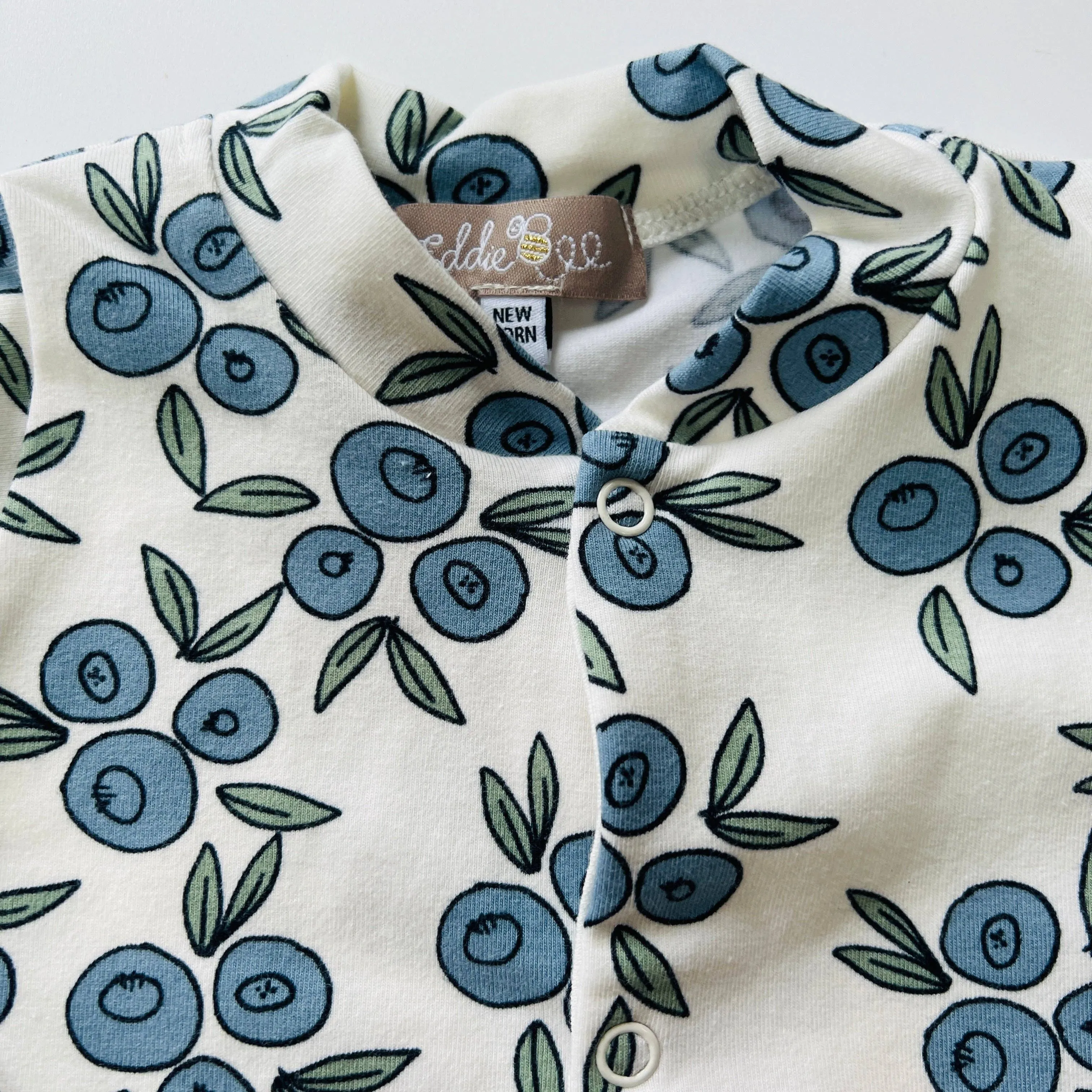 Organic cotton Baby sleepsuit  in Cream/Blueberry Print - Eddie & Bee